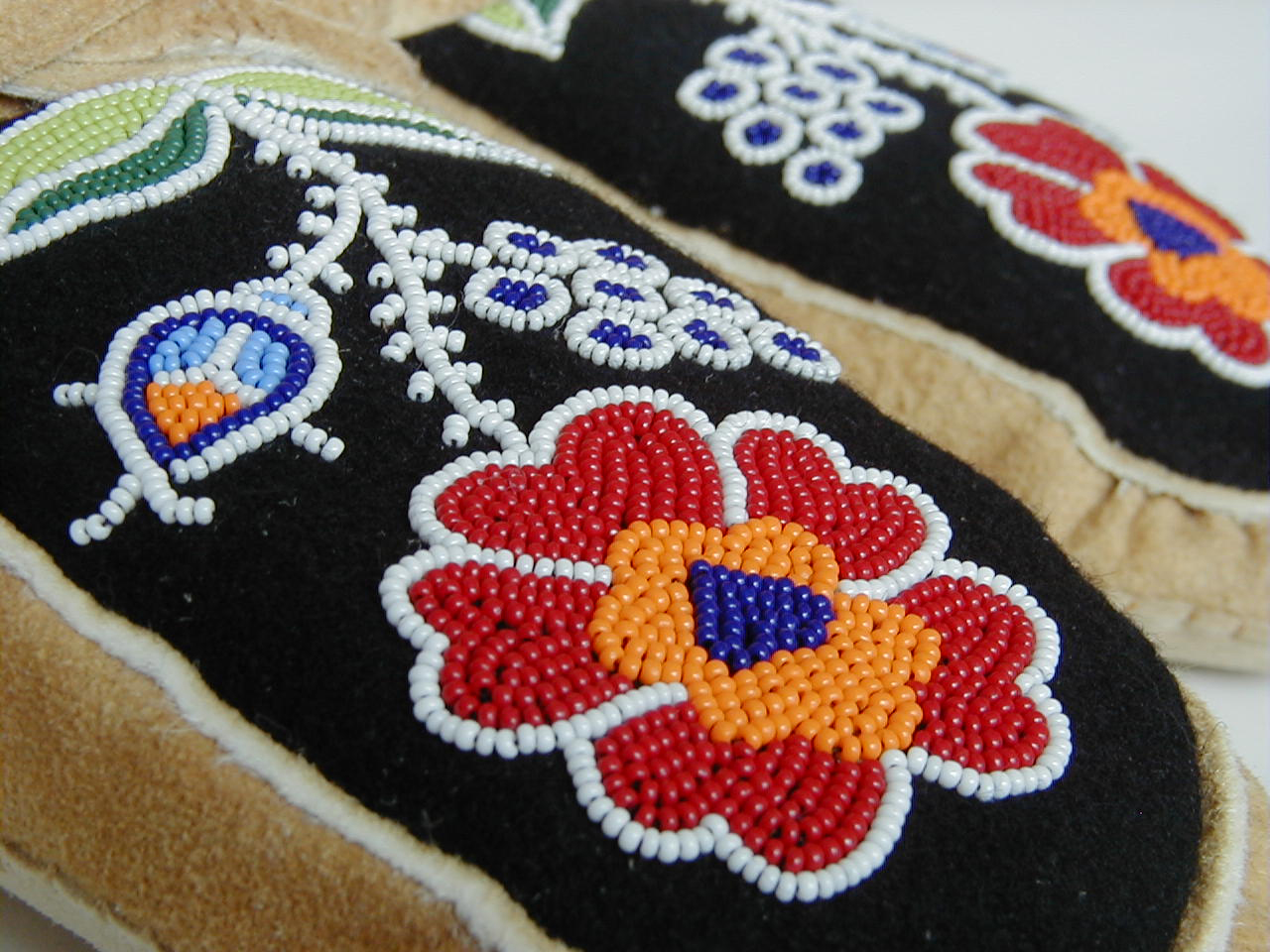 close up of beaded moccasins